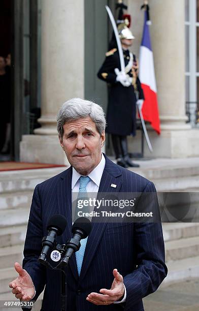 Secretary of State John Kerry talks to the media after a meeting with French President Francois Hollande at the Elysee Presidential Palace on...