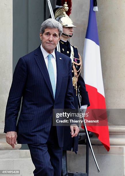 Secretary of State John Kerry leaves after a meeting with French President Francois Hollande at the Elysee Presidential Palace on November 17, 2015...