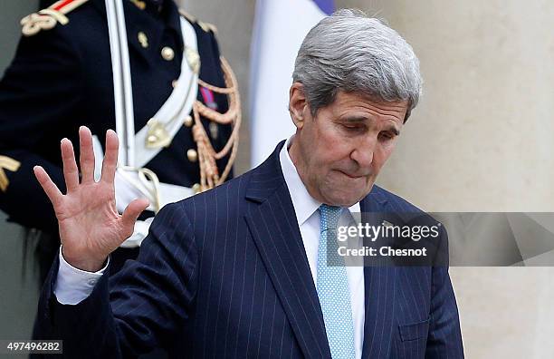 Secretary of State John Kerry leaves after a meeting with French President Francois Hollande at the Elysee Presidential Palace on November 17, 2015...