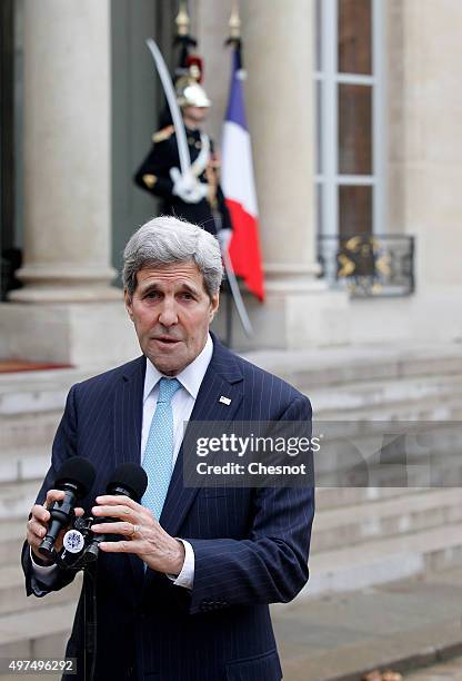 Secretary of State John Kerry talks to the media after a meeting with French President Francois Hollande at the Elysee Presidential Palace on...