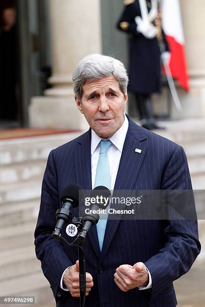 Secretary of State John Kerry talks to the media after a meeting with French President Francois Hollande at the Elysee Presidential Palace on...