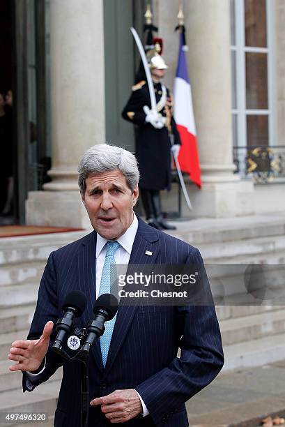 Secretary of State John Kerry talks to the media after a meeting with French President Francois Hollande at the Elysee Presidential Palace on...