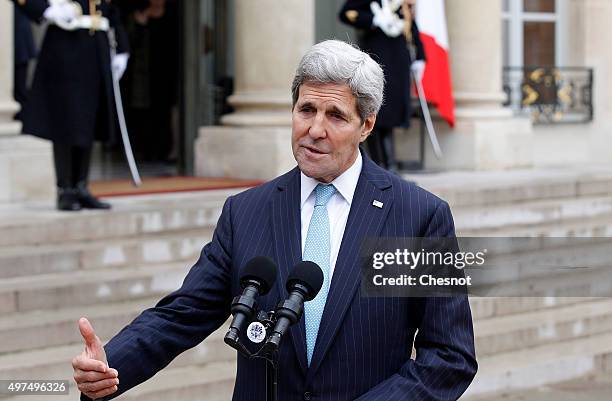 Secretary of State John Kerry talks to the media after a meeting with French President Francois Hollande at the Elysee Presidential Palace on...