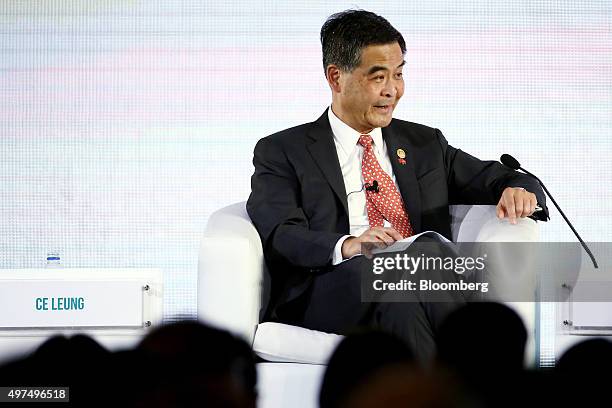 Leung Chun-ying, Hong Kong's chief executive, speaks at the Asia-Pacific Economic Cooperation CEO Summit in Manila, the Philippines, on Tuesday, Nov....