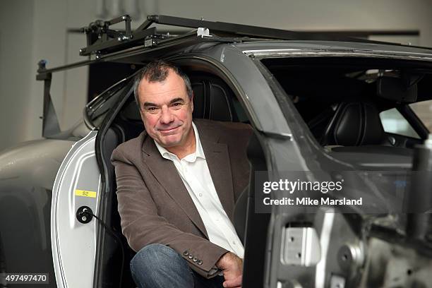 Christopher Corbould special effects coordinator on "Spectre" attends a photocall for an exhibition of the Cars featured in the new James Bond film...
