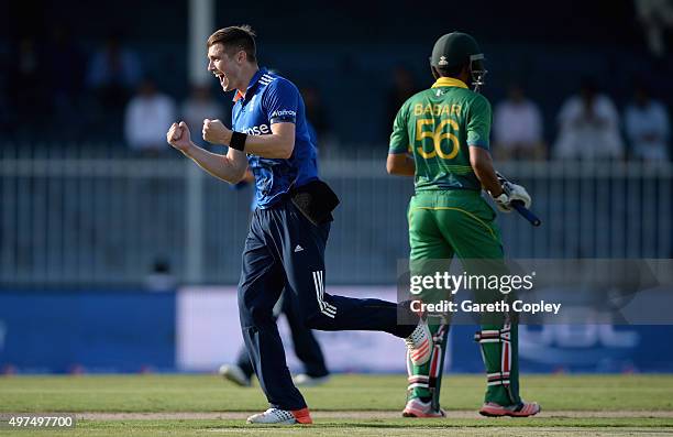 Chris Woakes of England celebrates dismissing Babar Azam of Pakistan during the 3rd One Day International match between Pakistan and England at...