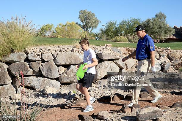 Ernie Els of South Africa with his son Ben Els during the SAP Invitational Golf Day at Dragon Ridge Country Club prior to the Els For Autism Grande...