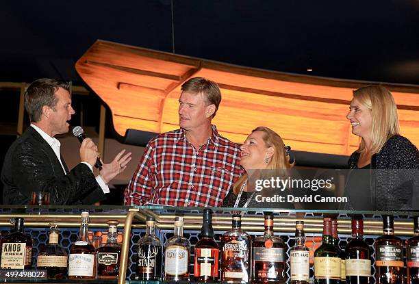 Ernie Els of South Africa and Maura Nolan of Irish Golf Links are interviewed by Todd Lewis of the Golf Channel watched by Erie El's wife Liezl Els...