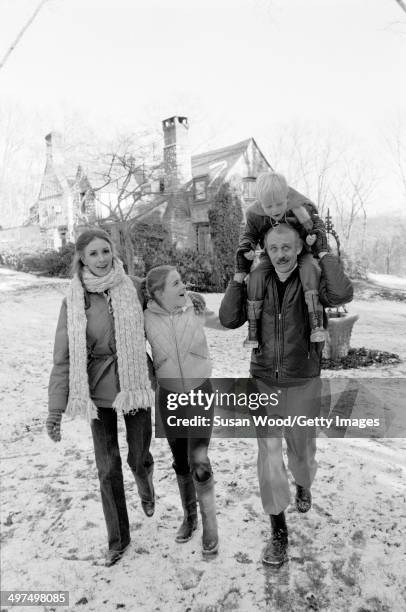 Dutch-born businesswoman and former model Wilhelmina Cooper and her husband, former television executive Bruce Cooper , walk with their children,...