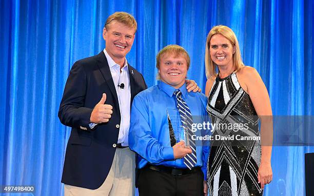 Ernie Els of South Africa and his wife Liezl Els with Josh Deer during the 2015 Els For Autism Golf Challenge Finale Awards Dinner held in the...