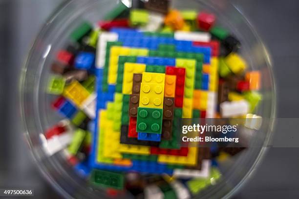 Lego toy bricks sit in a glass bowl in the reception area at the Lego A/S Factory in Kladno, Czech Republic, on Monday, Nov. 16, 2015. Lego A/S,...