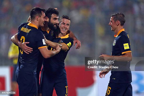 Mile Jedinak of Australia Socceroos celebrates with his team mates after scoring the 4th goal against Bangladesh during the 2018 FIFA World Cup...