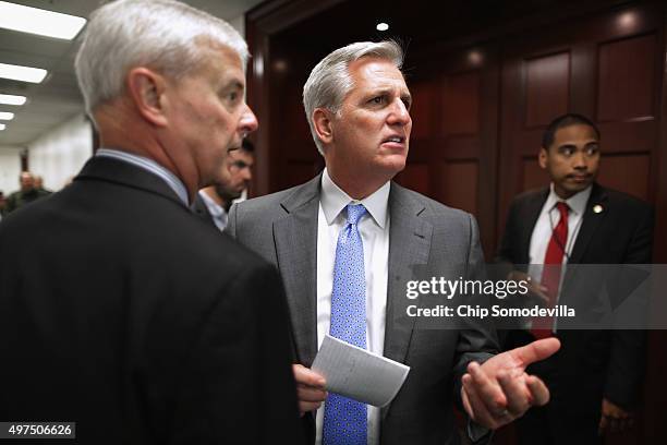 House Majority Leader Kevin McCarthy speaks with members and aids following the weekly Republican Conference meeting at the U.S. Capitol November 16,...