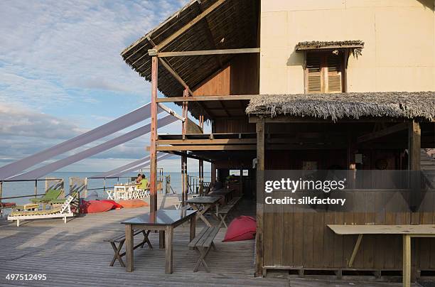 tropical beach restaurant in canoa quebrada, brazil - canoa quebrada stock pictures, royalty-free photos & images