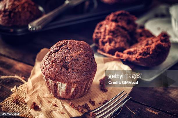 delicious homemade chocolate muffins - muffin stock pictures, royalty-free photos & images
