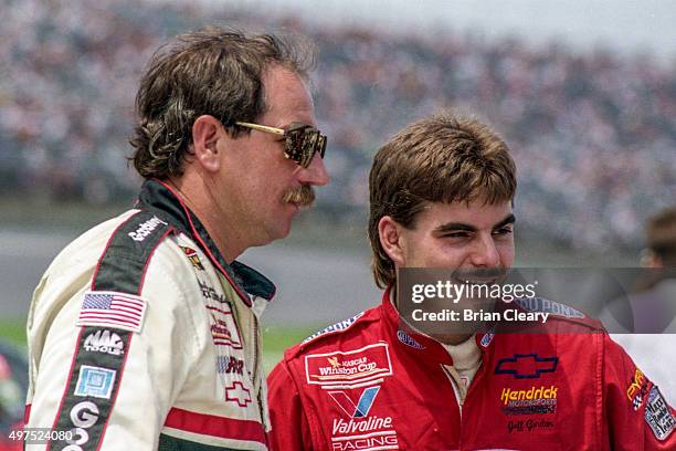 Jeff Gordon talks with Dale Earnhardt Sr. At Daytona International Speedway circa July 1993 in Daytona Beach, Florida.