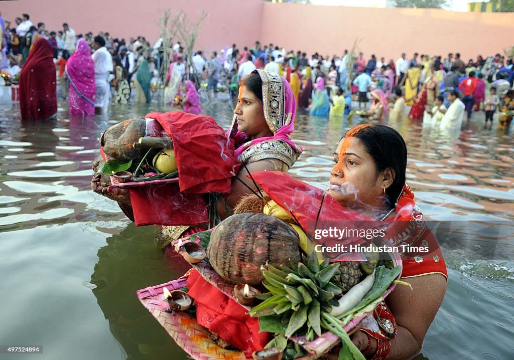 Chhatt Hindu devotees offer prayers during the Chhath festival on the banks ...