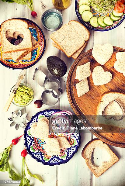 making tea sandwiches - cookie cutter stock pictures, royalty-free photos & images