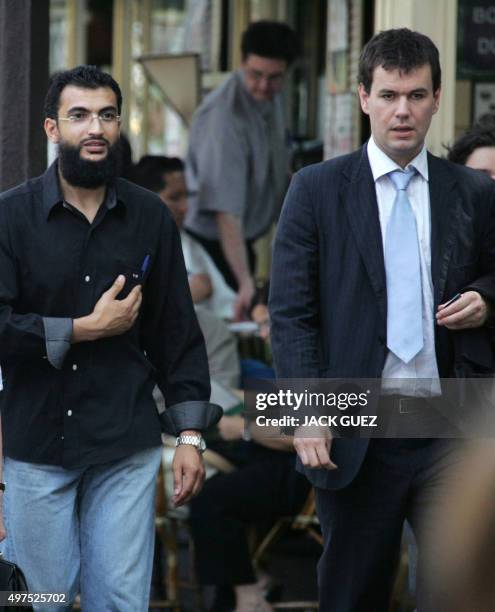 French defendant Khaled Ben Mustapha , who was released from the US base in Guantanamo Bay, and his lawyer Philippe Meilhac arrive at the Paris...