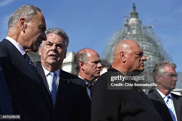 Sen. Charles Schumer talks with Rep. Peter King during a news conference with Joseph Zadroga , father of former NYPD Detective James Zadroga, and...