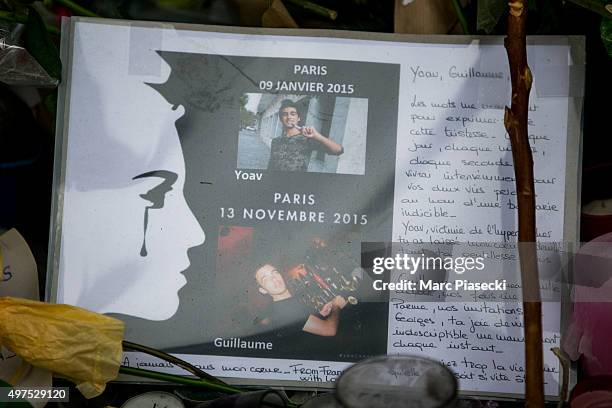 Tributes and flowers are left near the 'La Belle Equipe' restaurant on November 17, 2015 in Paris, France. Paris remains under heightened security...