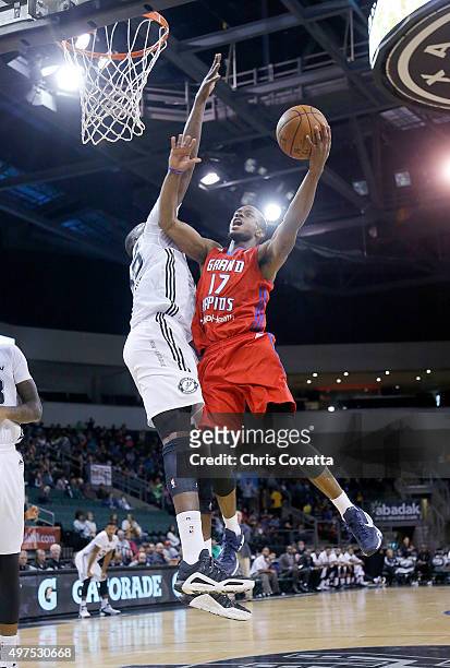 Lorenzo Brown of the Grand Rapids Drive shoots over Youssou Ndoye of the Austin Spurs at the Cedar Park Center on November 17, 2015 in Cedar Park,...