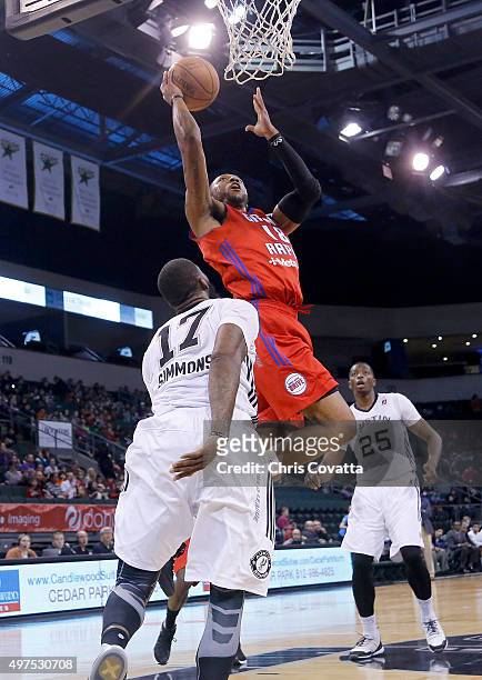Kammeon Holsey of the Grand Rapids Drive shoots the ball against Jonathon Simmons of the Austin Spurs at the Cedar Park Center on November 17, 2015...