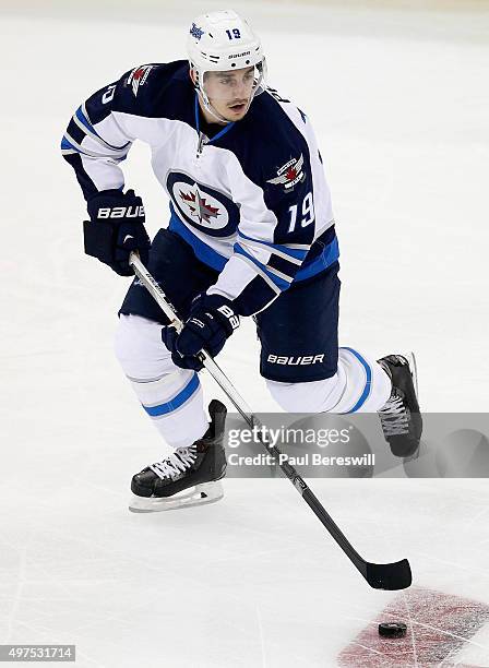 Jim Slater of the Winnipeg Jets plays in the game against the New Jersey Devils at the Prudential Center on October 9, 2015 in Newark, New Jersey.