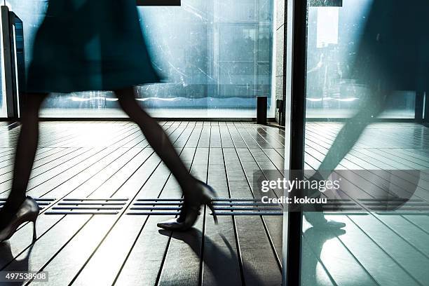 woman it is glass door easy reflection - womens footwear stock pictures, royalty-free photos & images