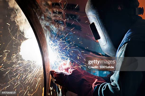 welder's special tecnique - sheet metal stock pictures, royalty-free photos & images