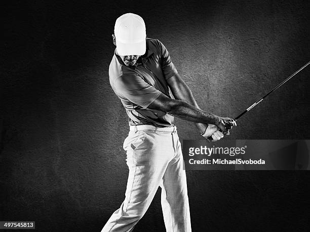 b & w golf - golf swing foto e immagini stock