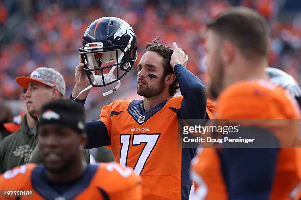 Quarterback Brock Osweiler of the Denver Broncos looks on from the bench Kansas City Chiefs at Sports Authority Field at Mile High on November 15,...
