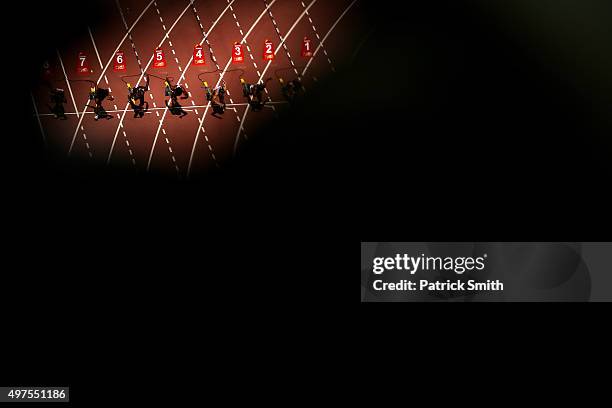 Runners leave the starting blocks during the Women's 100 meters heats on day two of the 15th IAAF World Athletics Championships Beijing 2015 at...