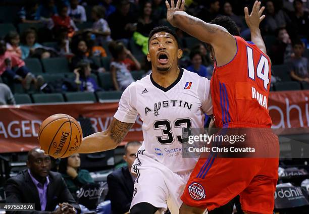 Orlando Johnson of the Austin Spurs drives around Stefhon Hannah at the Cedar Park Center on November 17, 2015 in Cedar Park, Texas. NOTE TO USER:...