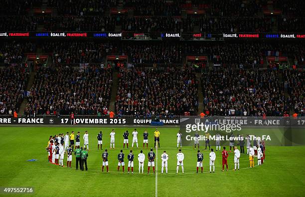 Players come together for the minutes silence remember those who lost their lives in the recent Paris attack prior to the International Friendly...