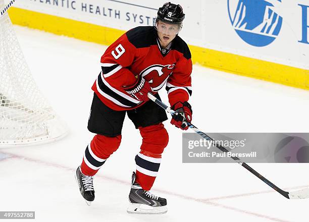 Jiri Tlusty of the New Jersey Devils plays in the game against the Winnipeg Jets at the Prudential Center on October 9, 2015 in Newark, New Jersey.