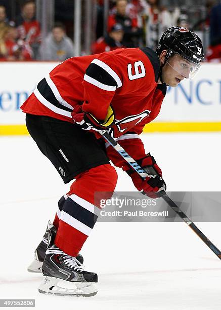 Jiri Tlusty of the New Jersey Devils plays in the game against the Winnipeg Jets at the Prudential Center on October 9, 2015 in Newark, New Jersey.