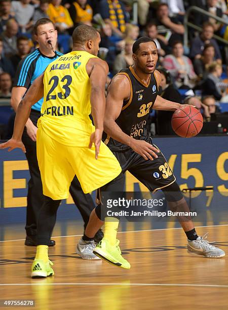 Jordan Taylor of ALBA Berlin and Tekele Cotton of the MHP Riesen Ludwigsburg during the game between Alba Berlin and MHP Riesen Ludwigsburg on...