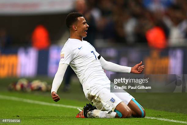 Dele Alli of England celebrates scores his team's first goal during the International Friendly match between England and France at Wembley Stadium on...