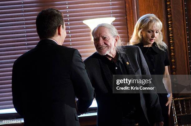 Michael Feinstein andWillie Nelson attend the 2015 Gershwin Prize Luncheon Honoring Willie Nelson in the Thomas Jefferson Building of the Library of...