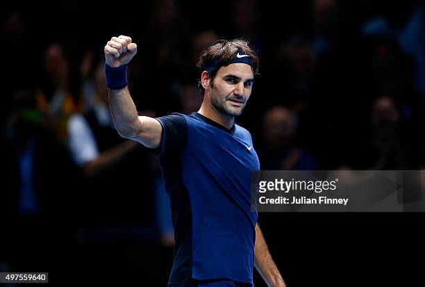 Roger Federer of Switzerland celebrates victory in his men's singles match against Novak Djokovic of Serbia during day three of the Barclays ATP...