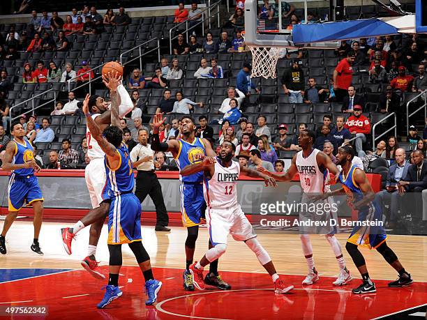 Branden Dawson of the Los Angeles Clippers shoots the ball against the Golden State Warriors at STAPLES Center on October 20, 2015 in Los Angeles,...