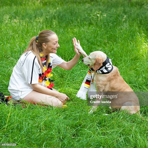 two german football fans - dog fan stock pictures, royalty-free photos & images