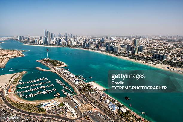 abu dhabi from the helicopter - united arab emirates aerial stock pictures, royalty-free photos & images