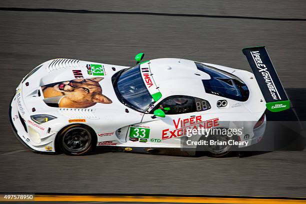 The Dodge Viper GT3 of Ben Keating, Jeroen Bleekemolen, Marc Miller nad Dominik Farnbacher races through the banking during IMSA testing at Daytona...