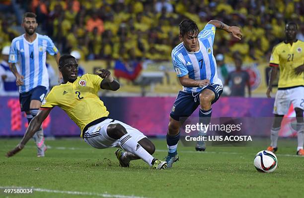 Colombia's Cristian Zapata and Argentina's Paulo Dybala vie for the ball during their Russia 2018 FIFA World Cup South American Qualifiers football...