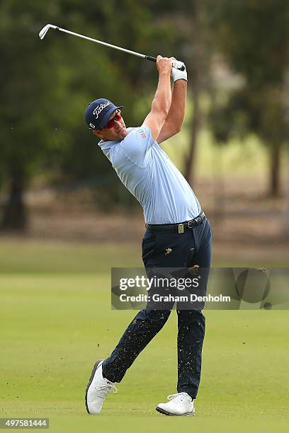 Adam Scott of Australia plays a shot from the fairway during the Pro-Am ahead of the 2015 Australian Masters at Huntingdale Golf Course on November...