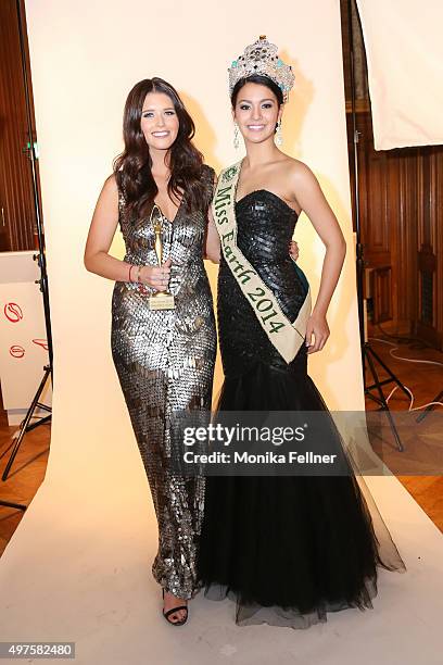 Katherine Schwarzenegger wins an award and poses with Miss Earth 2014 Jamie Herrell at the Look Women Of The Year Awards 2015 at the city hall on...
