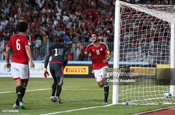 Ahmed Hassan Koka of Egypt celebrates after scoring a goal during the 2018 FIFA World Cup Round 2 - Group G in the return leg match between Egypt and...