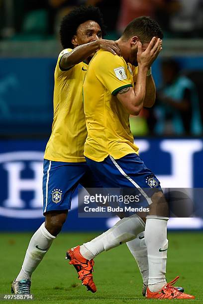 Willian and Renato Augusto of Brazil celebrate a scored goal during a match between Brazil and Peru as part of 2018 FIFA World Cup Russia Qualifiers...